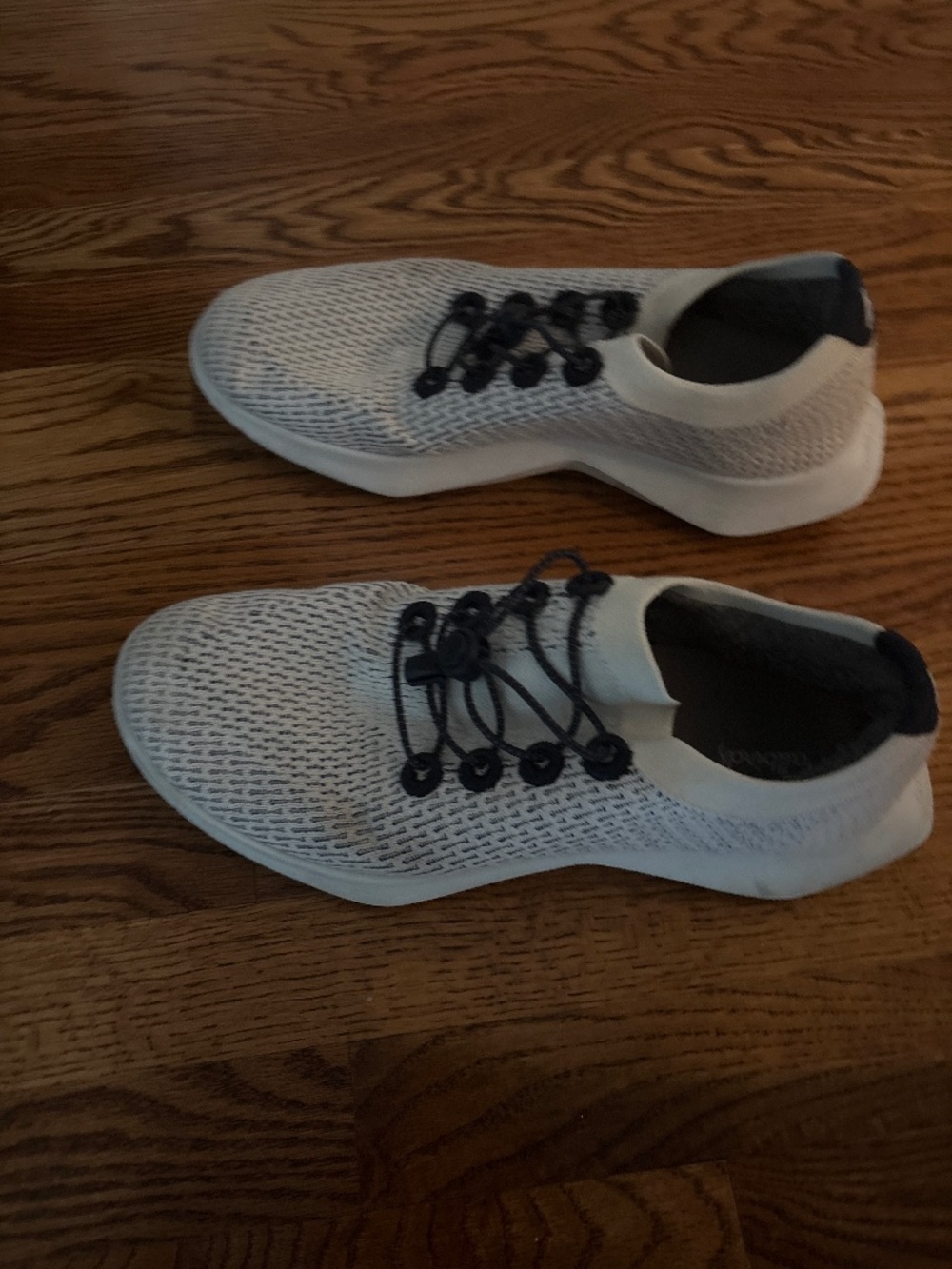 White and navy Allbirds